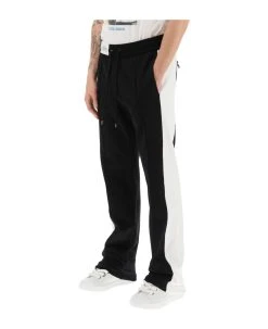 Dolce & Gabbana Jogger Pants With Lettering Logo Patch -Stylish Men-Dolce & Gabbana 16ec22645552b9c20bf037b9f0fae43d